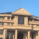 梧州黄金麻别墅外墙干挂石材效果示例
